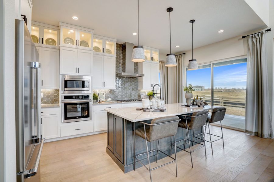 Furnished interior in a model home at Kitchel Lake at Serratoga Falls in Timnath (Image 11).