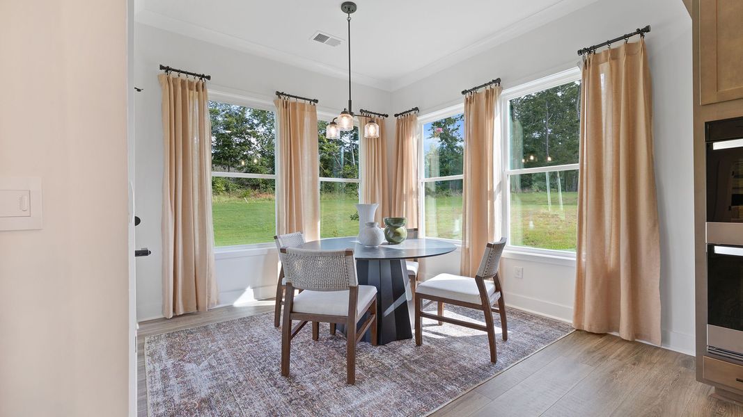 Furnished interior in a model home at Seven Oaks in Greenwood (Image 11).