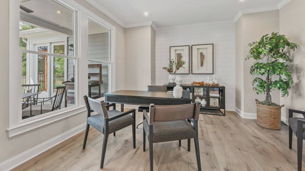 Furnished interior in a model home at The Courtyards at Post Road in Cumming (Image 7).