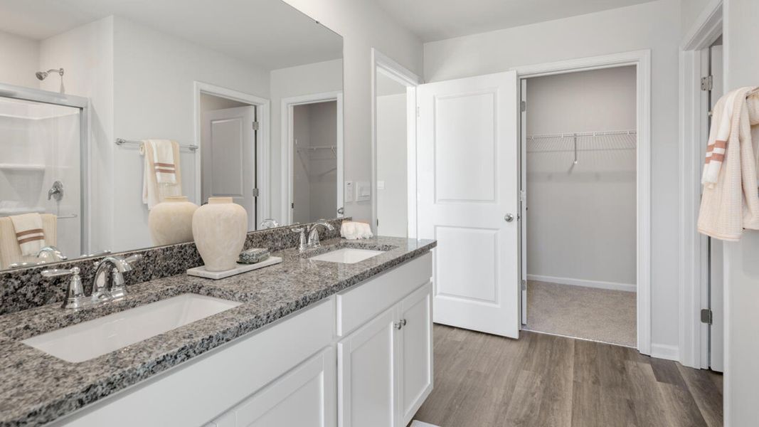 Furnished interior in a model home at The Grove at Blake Farm in Wilmington (Image 31). Furnished interior in a model home at The Grove at Blake Farm in Wilmington (Image 31).