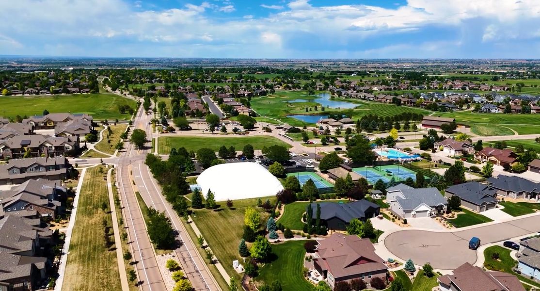 Aerial view of the Country Farms Village - The Cottages community in Windsor, CO, showing layout and nearby surroundings (Image 5). Aerial view of the Country Farms Village - The Cottages community in Windsor, CO, showing layout and nearby surroundings (Image 5).