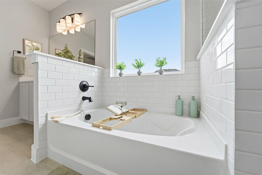 Furnished interior in a model home at Infinity Square in Kyle (Image 37).