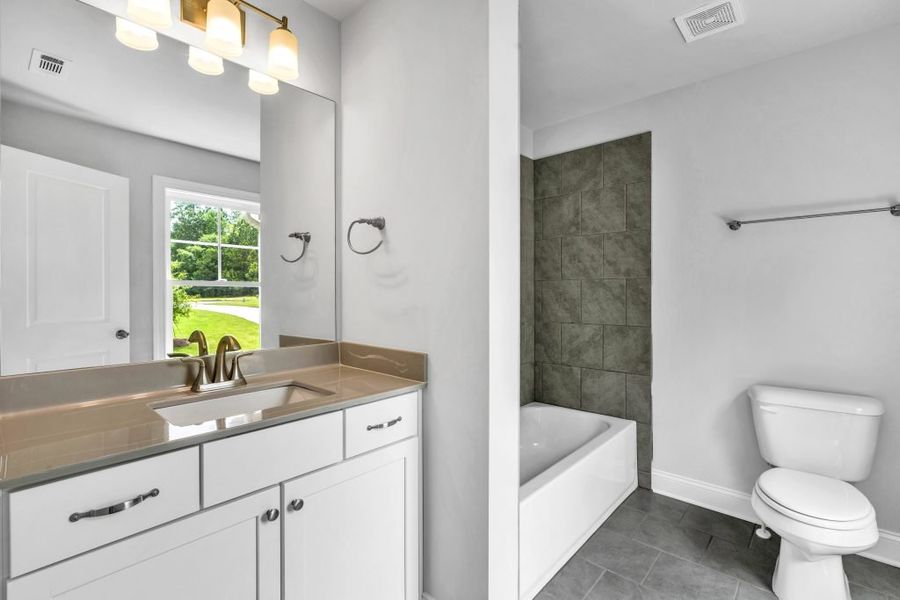 Furnished interior in a model home at The Estates at Hurricane Pointe in Douglasville (Image 46).