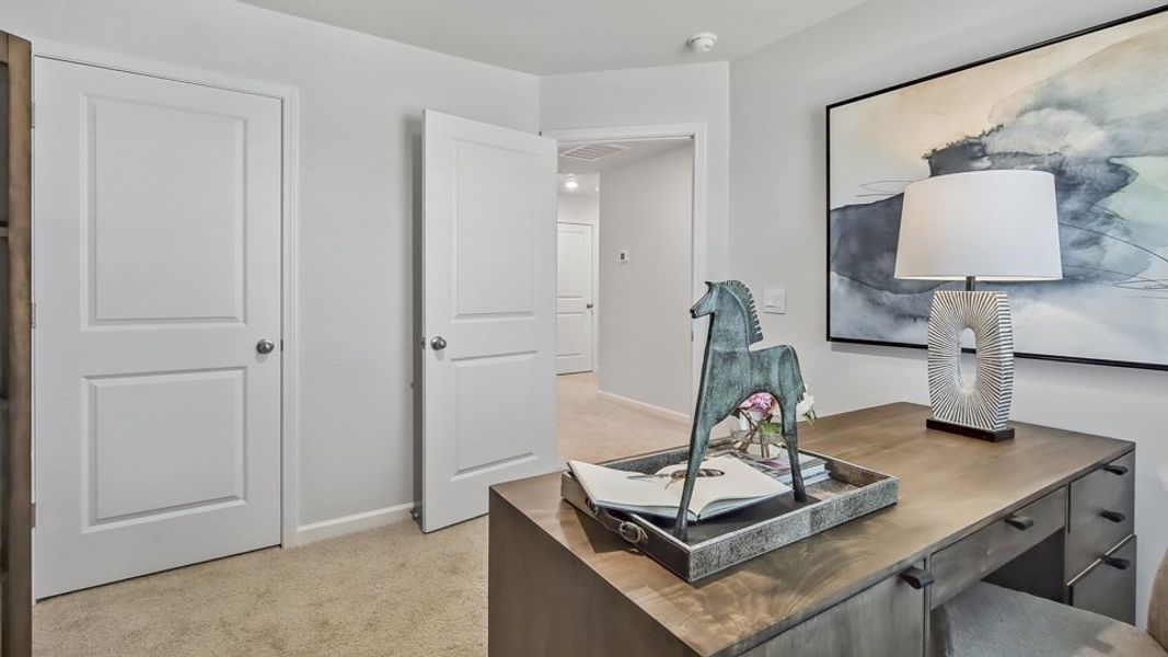 Furnished interior in a model home at The Townes at Honeycutt Oaks in Angier (Image 35).