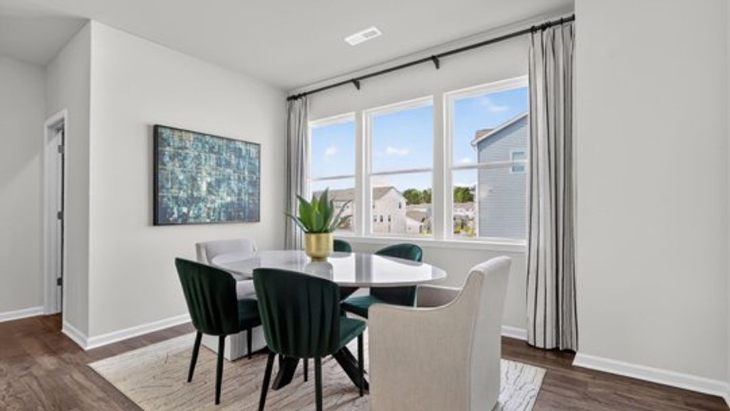 Furnished interior in a model home at The Townes at Madden West in Fuquay Varina (Image 35).