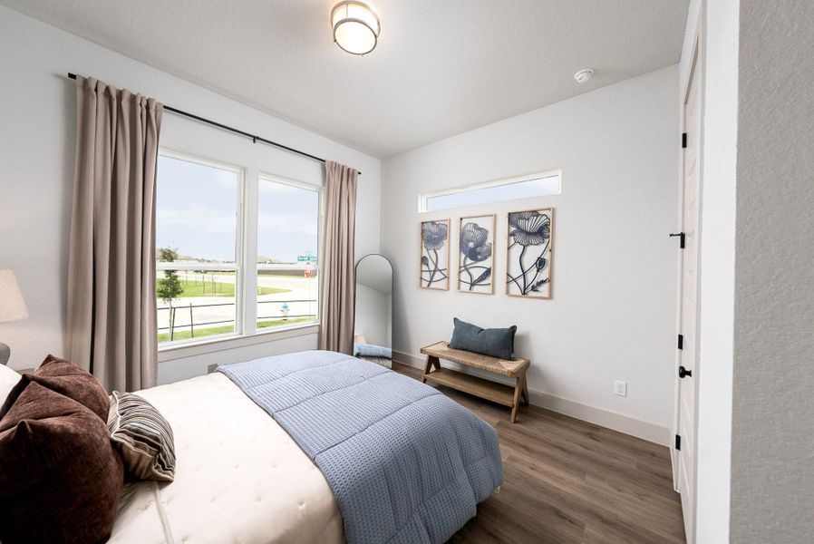 Furnished interior in a model home at Weltner Farms 60’s in New Braunfels (Image 38).