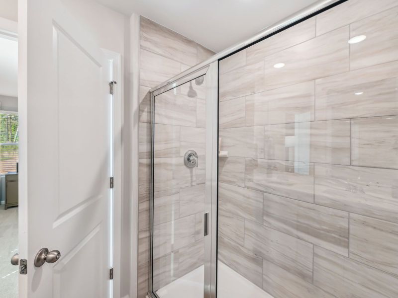 The spacious primary suite features a large walk-in closet and an ensuite bath. The spacious primary suite features a large walk-in closet and an ensuite bath.