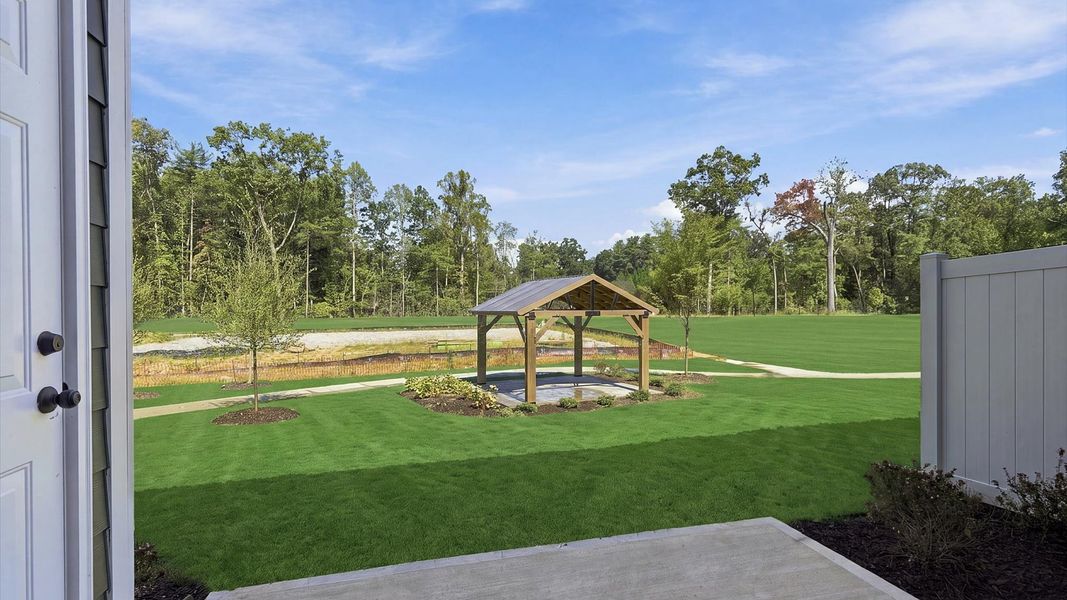 Exclusive backyard with a private patio with accomplished detail and elevated outdoor living potential at Brookland Place