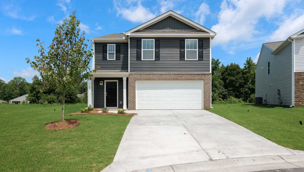 Front exterior of a home in the Harper Ridge community, located in Roebuck, SC (Image 1).