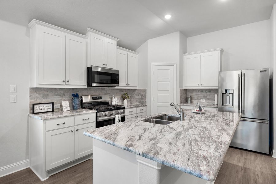 Furnished interior in a model home at Fox Landing in Caddo Mills (Image 4).