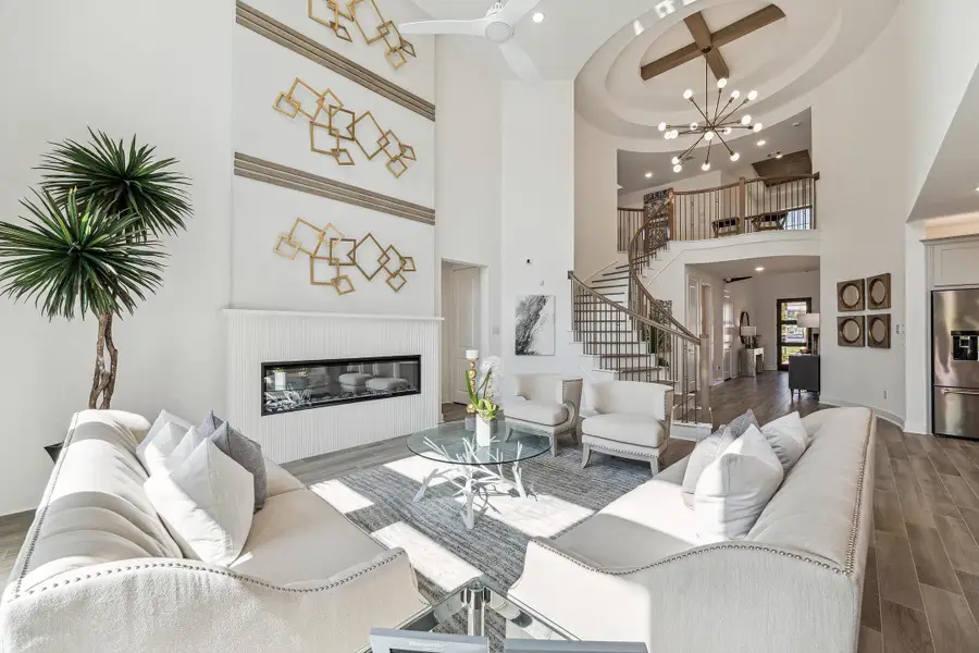 Furnished interior in a model home at The Woodlands Hills – 55' in Willis (Image 8).