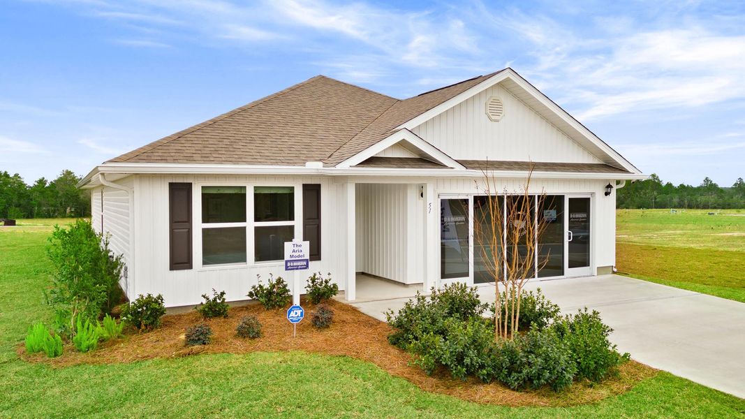 Front exterior of a home in the Magnolia at the Bluffs Phase 3 community, located in Freeport, FL (Image 1).