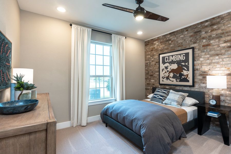 Furnished interior in a model home at Travisso Capri in Leander (Image 15).