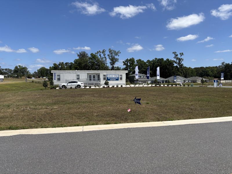 Modern information center and model homes in Bennah Oaks by Highland Homes of Florida, Belleview, FL.