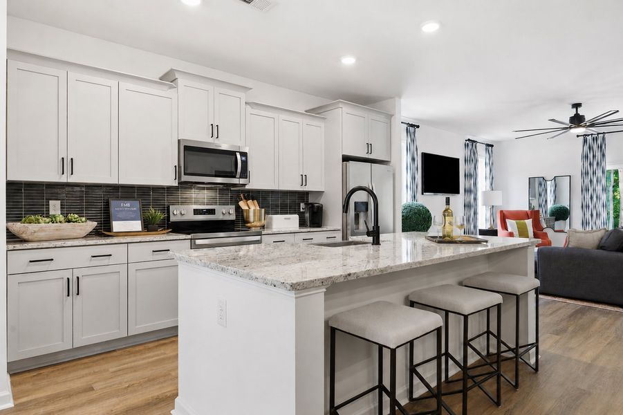 Furnished interior in a model home at The Knoll at White Oak in Garner (Image 4).