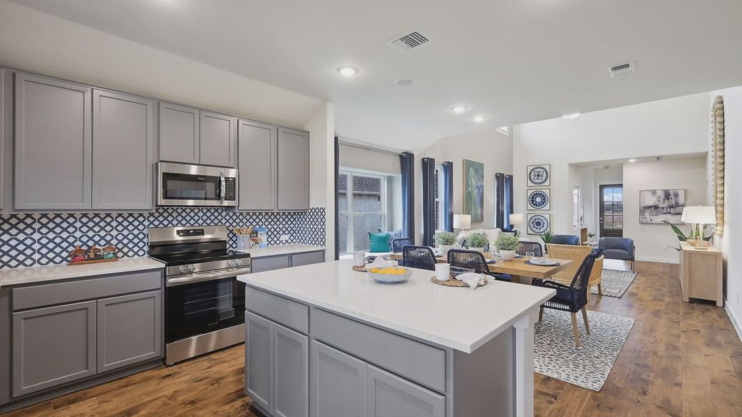 Experience refined living with gray cabinetry and exquisite backsplash in Churchill. Elegant and contemporary elegance. Experience refined living with gray cabinetry and exquisite backsplash in Churchill. Elegant and contemporary elegance.