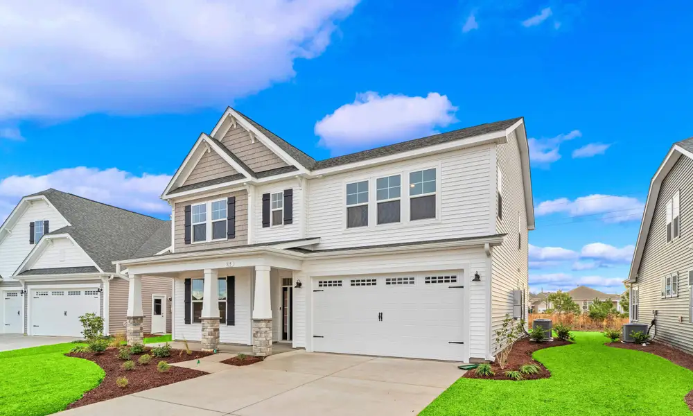 Front exterior of a home in the Bridgewater - Shorehaven Village community, located in Little River, SC (Image 3).