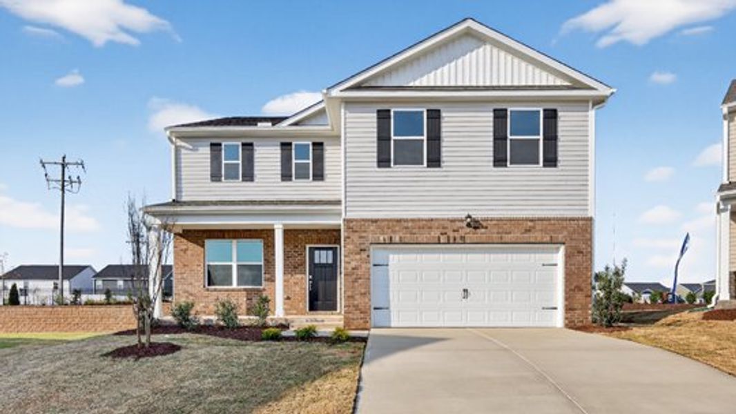 Front exterior of a home in the The Reserve at Prestleigh community, located in Wake Forest, NC (Image 14).
