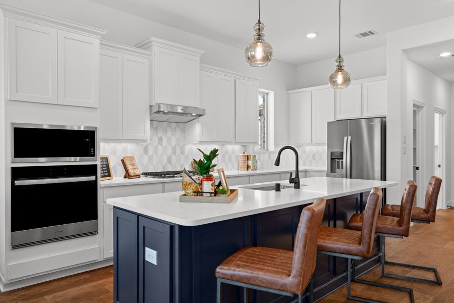 Furnished interior in a model home at Brookville Estates in Forney (Image 3).