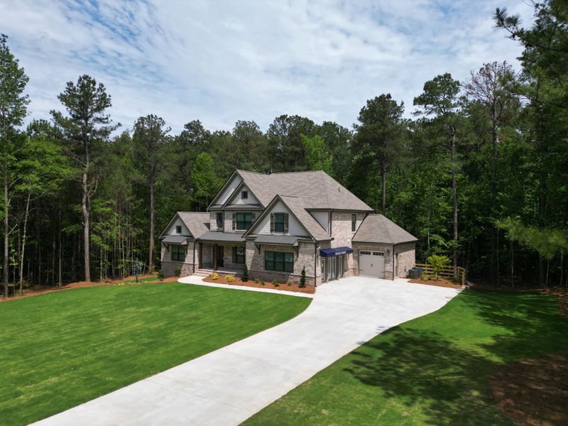 Front exterior of a home in the St. Regis community, located in Oxford, GA (Image 8).
