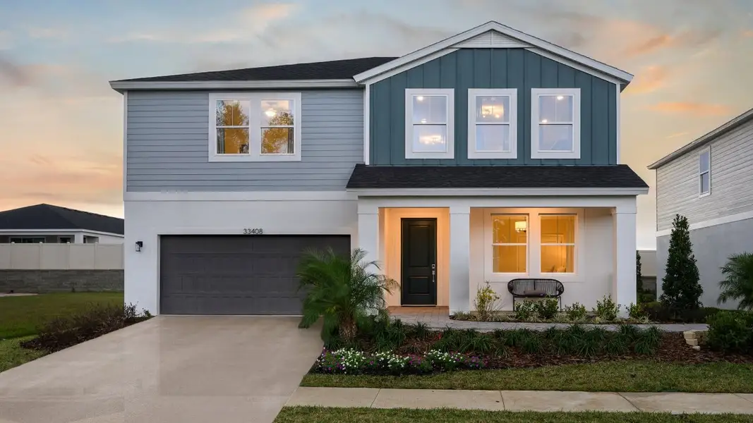 Front exterior of a home in the Pasadena Woods community, located in Dade City, FL (Image 3).