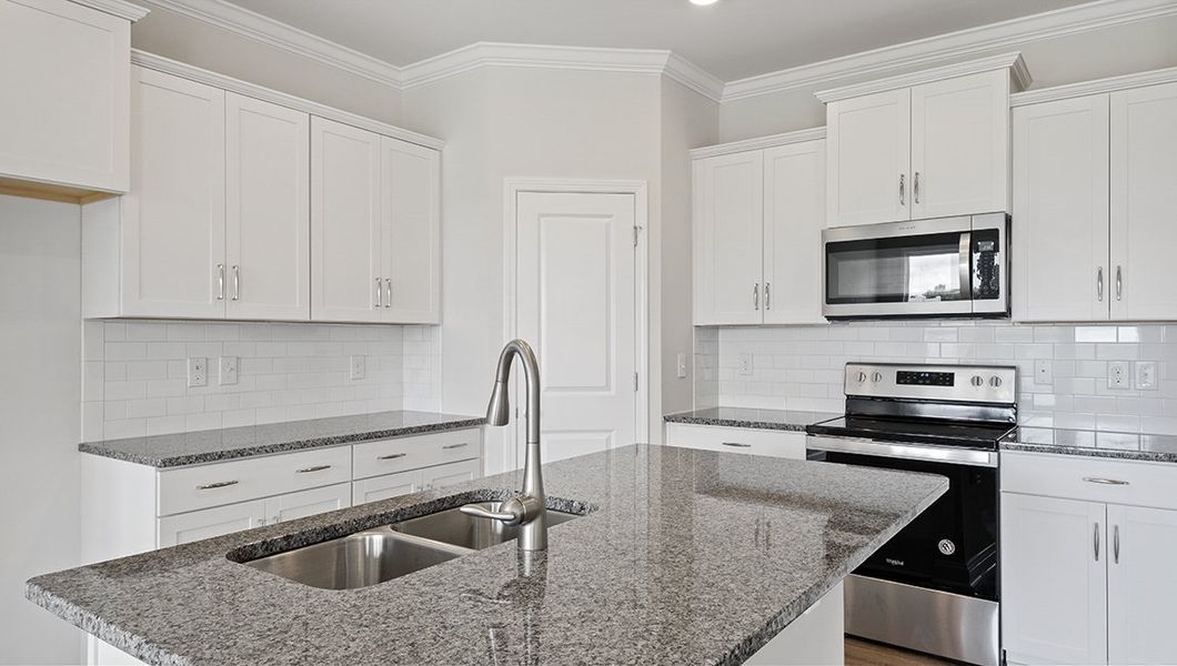 Furnished interior in a model home at Hidden Hills in Spartanburg (Image 7).