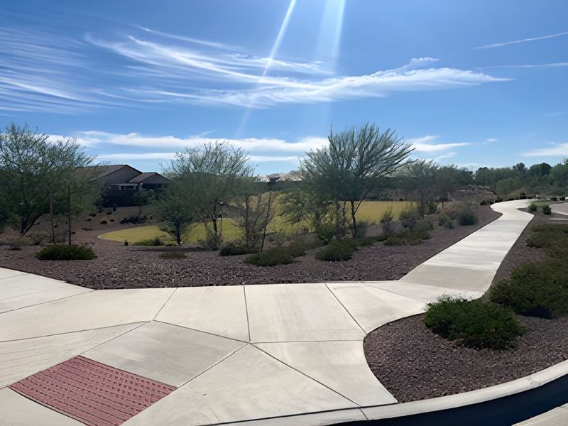 A scenic path with desert landscaping in The Enclaves at Desert Oasis by KB Home, Surprise, AZ. A scenic path with desert landscaping in The Enclaves at Desert Oasis by KB Home, Surprise, AZ.