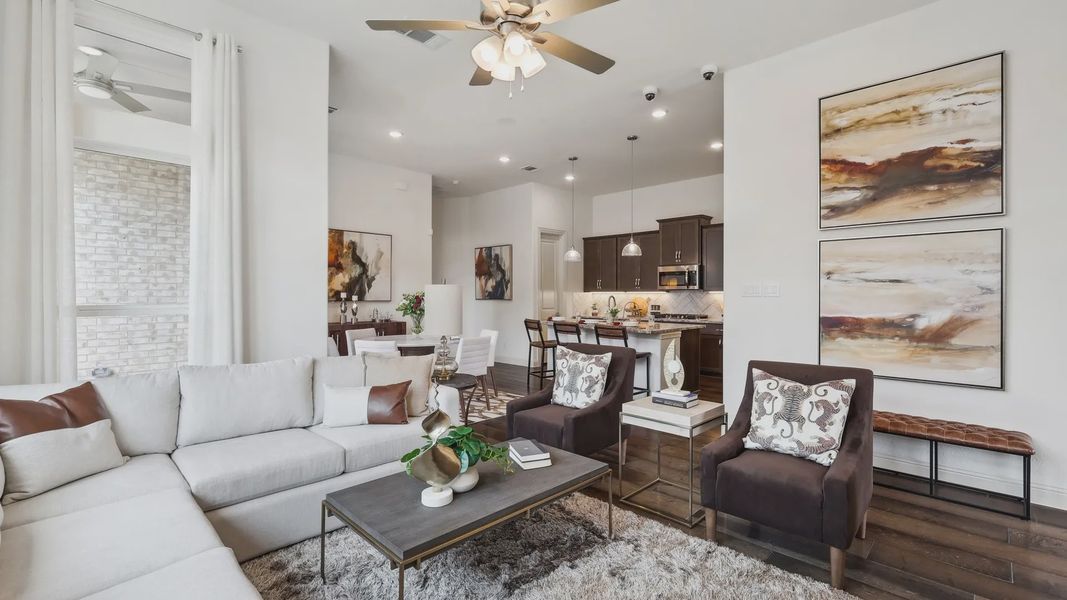 Exquisite design with plush seating, chic wood floors, and contemporary art in Heritage Park. Perfect for luxury living.