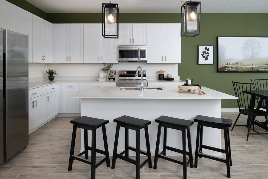 Furnished interior in a model home at Leela Reserve in Tavares (Image 29).