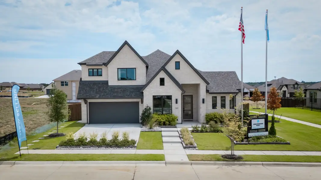 Front exterior of a home in the Panchasarp Farms community, located in Burleson, TX (Image 1). Front exterior of a home in the Panchasarp Farms community, located in Burleson, TX (Image 1).