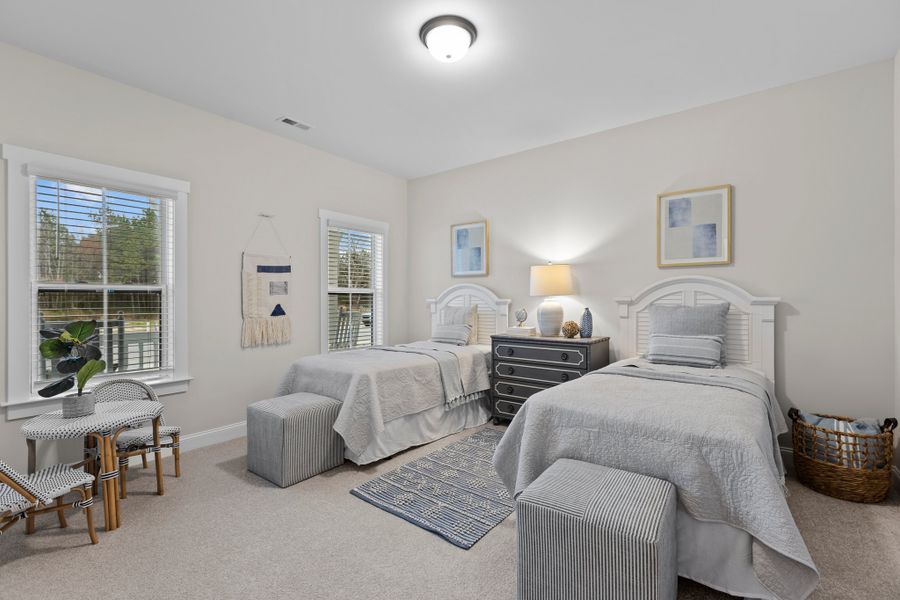 Furnished interior in a model home at Eli's Ridge in Winterville (Image 24).