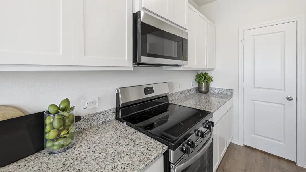 Furnished interior in a model home at Sanger Circle in Sanger (Image 56).