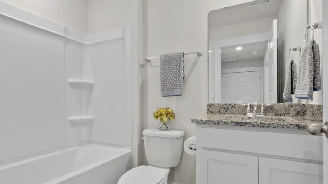 Furnished interior in a model home at The Townes at Cedar Hill Landing in Navassa (Image 29).