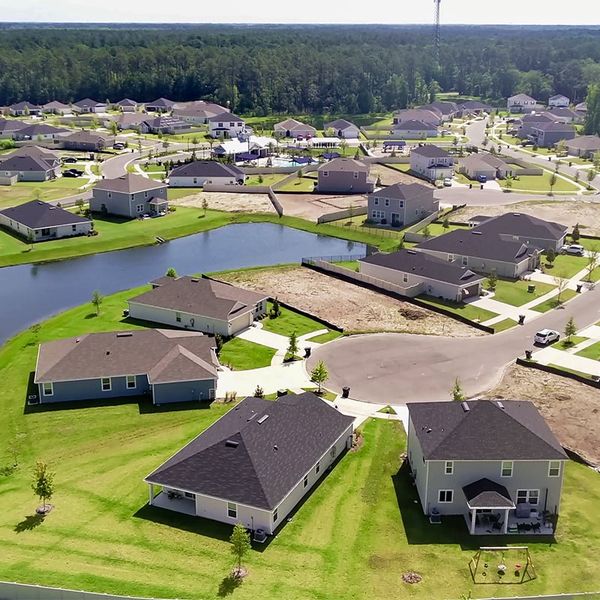 Aerial view of the Anabelle Island - Executive Series community in Green Cove Springs, FL, showing layout and nearby surroundings (Image 14).