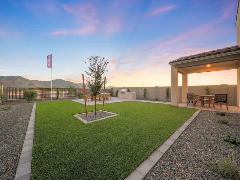 A building with a grass yard.