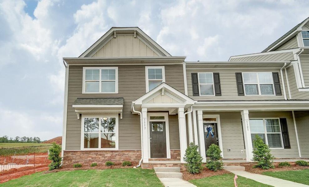 Front exterior of a home in the Bryton Crossing Townhomes community, located in Huntersville, NC (Image 2). Front exterior of a home in the Bryton Crossing Townhomes community, located in Huntersville, NC (Image 2).