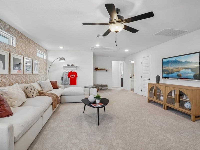 Furnished interior in a model home at Fairway Crossing in Converse (Image 16).