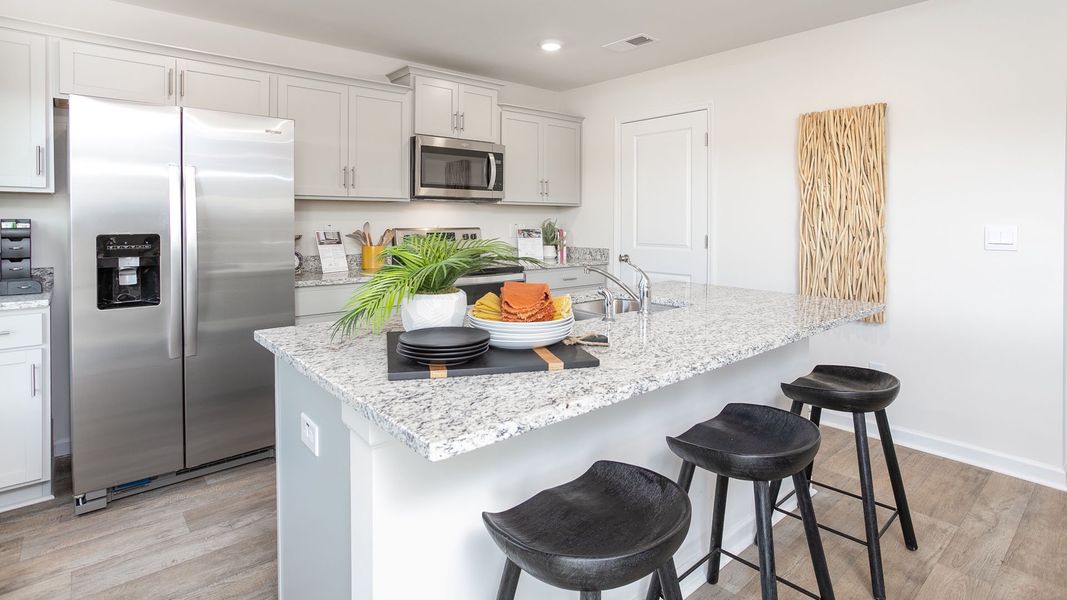 Furnished interior in a model home at Edinborough in Gibsonville (Image 8).