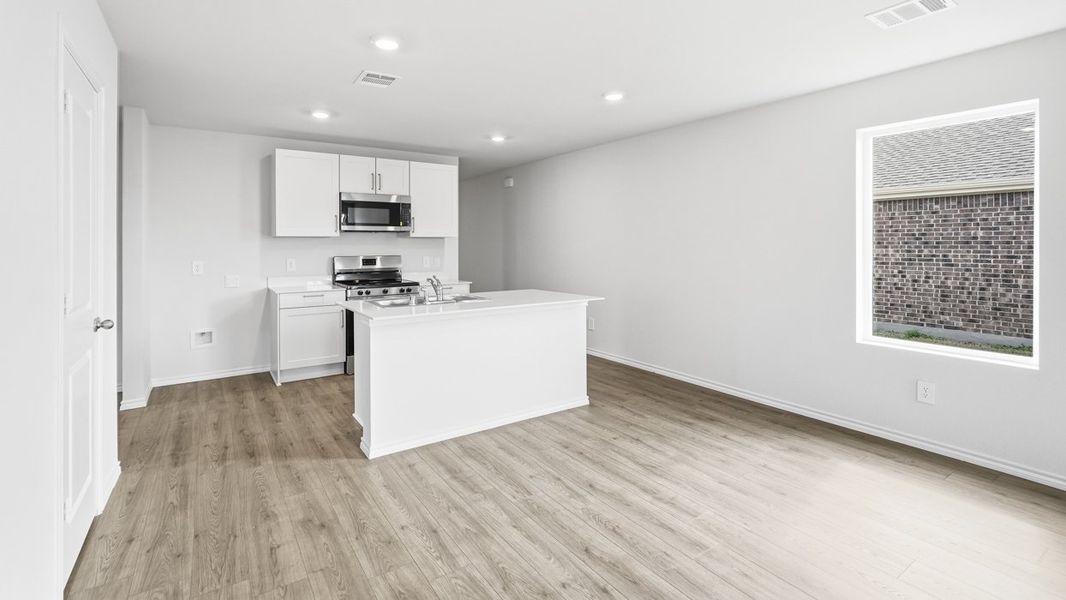 Furnished interior in a model home at Leonard Crossing in Leonard (Image 3).