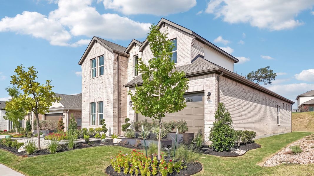 Front exterior of a home in the The Enclave at Bar W Ranch community, located in Leander, TX (Image 6). Front exterior of a home in the The Enclave at Bar W Ranch community, located in Leander, TX (Image 6).