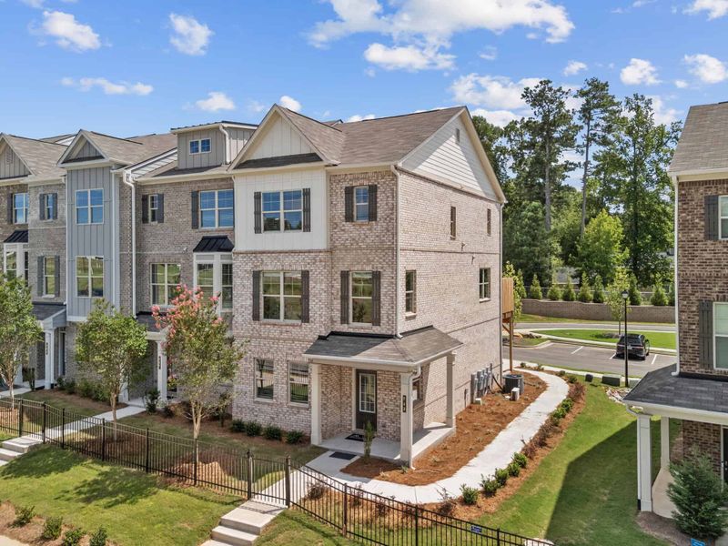 Front exterior of a home in the Towns at Enclave community, located in Lawrenceville, GA (Image 17). Front exterior of a home in the Towns at Enclave community, located in Lawrenceville, GA (Image 17).
