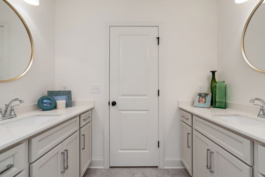 Furnished interior in a model home at Aden Woods of Castleberry Farms in Fairview (Image 11).