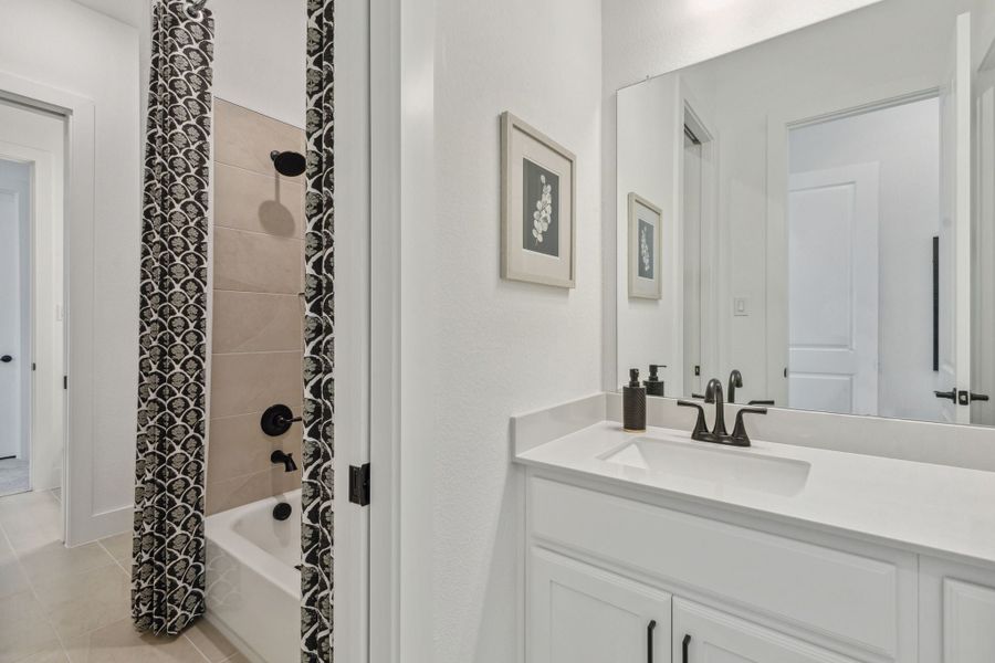 Furnished interior in a model home at Newman Village Townhomes in Frisco (Image 52).