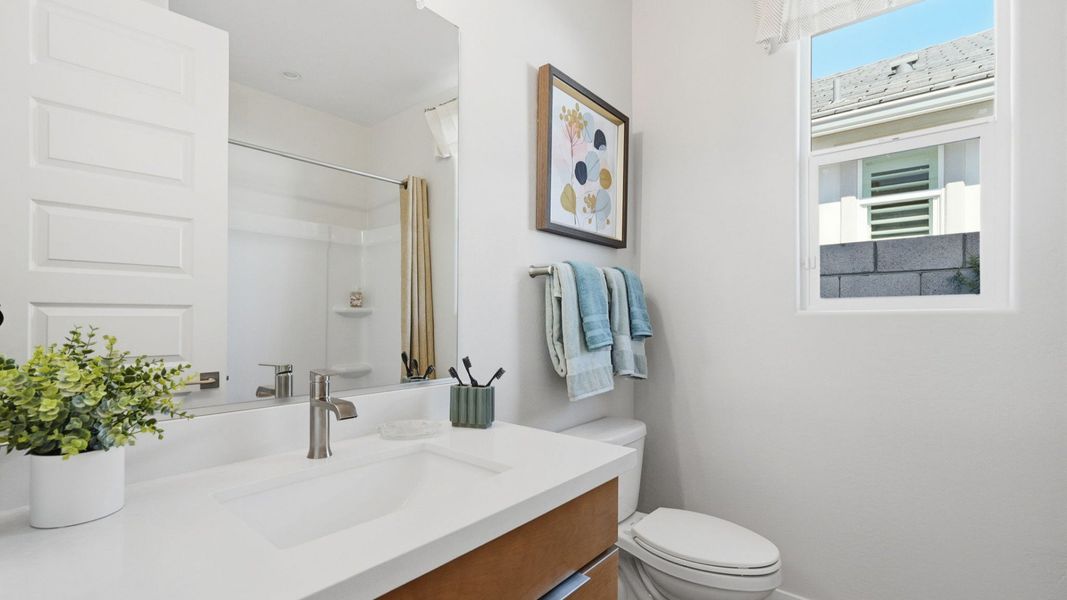 Furnished interior in a model home at Teravalis in Buckeye (Image 37).