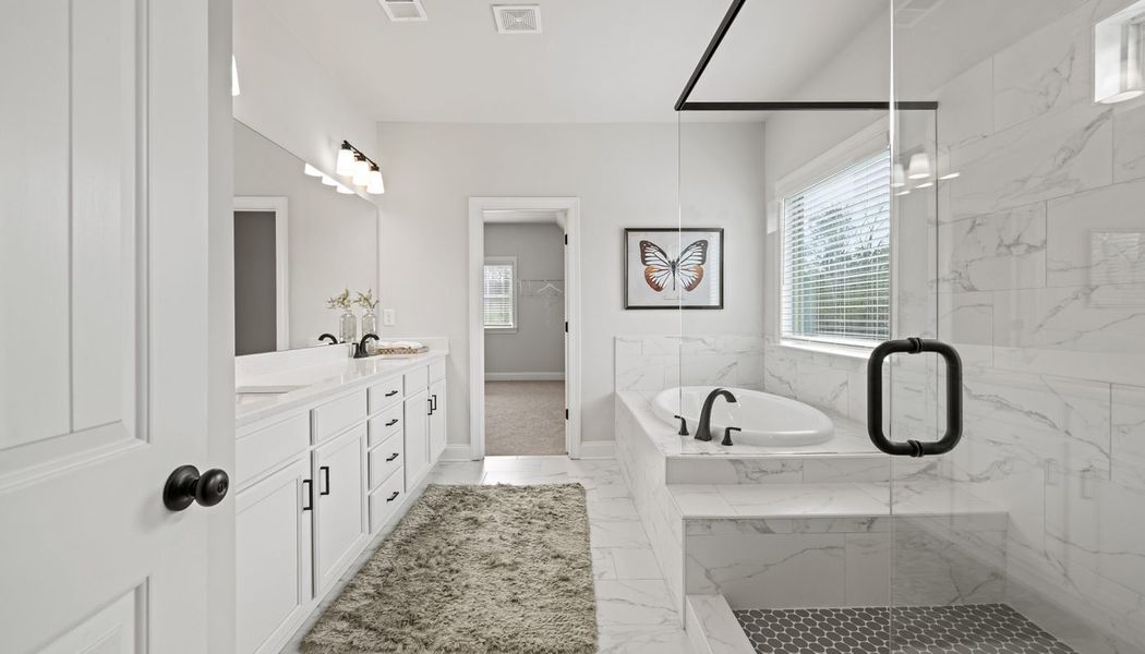 Furnished interior in a model home at Traditions of Braselton in Jefferson (Image 30).