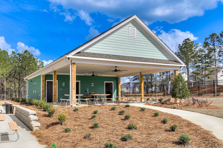 Comfortable poolside seating and shade