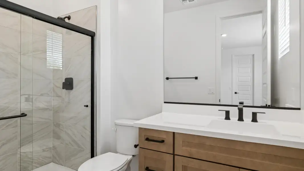 Furnished interior in a model home at Oak Park Manor Signature Homesites in Phoenix (Image 17).