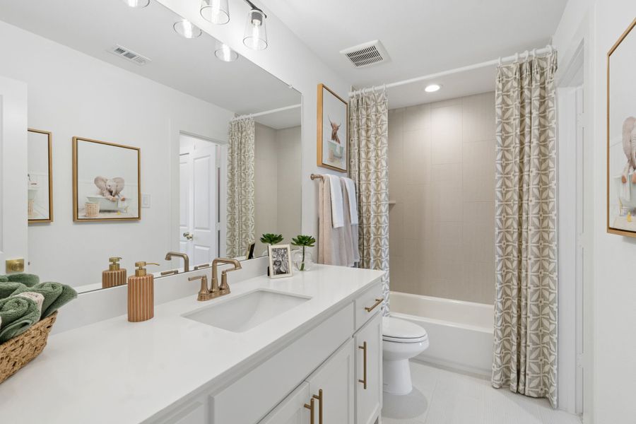 Furnished interior in a model home at Sweetgrass 65s in Haslet (Image 44).