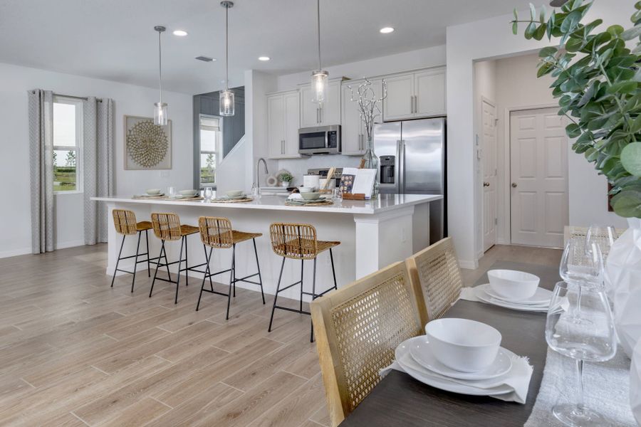 Dining Room & Kitchen | Trinity Lakes | New homes in Groveland, Florida | Landsea Homes