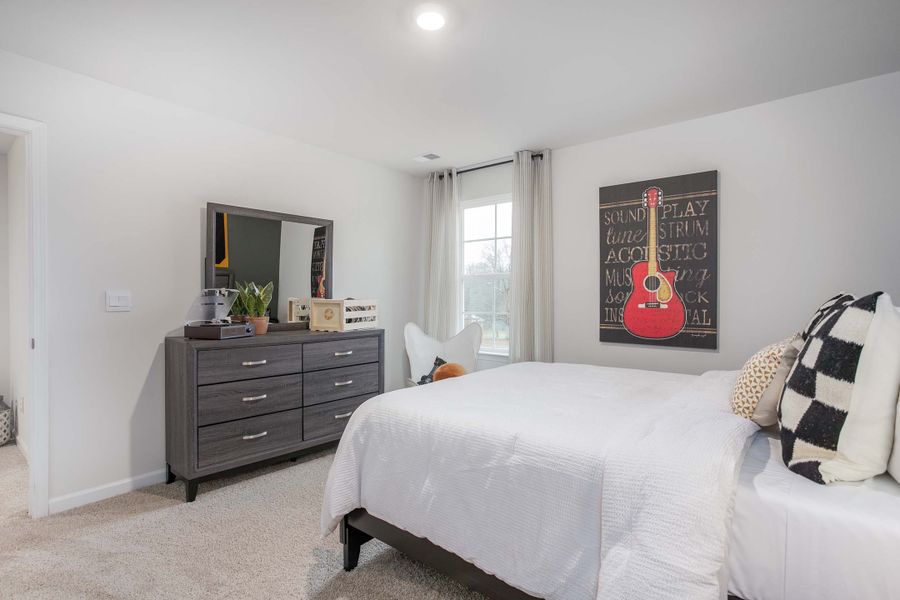 Furnished interior in a model home at Ridge Pointe in Trinity (Image 33).